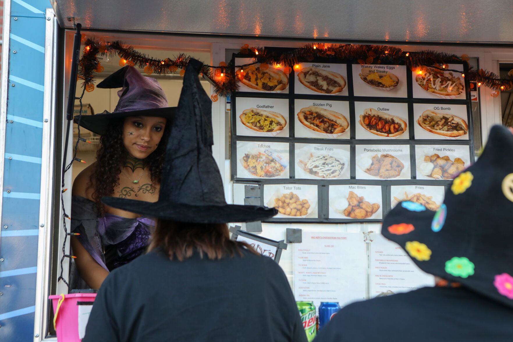 Brianna Walker takes customers' orders